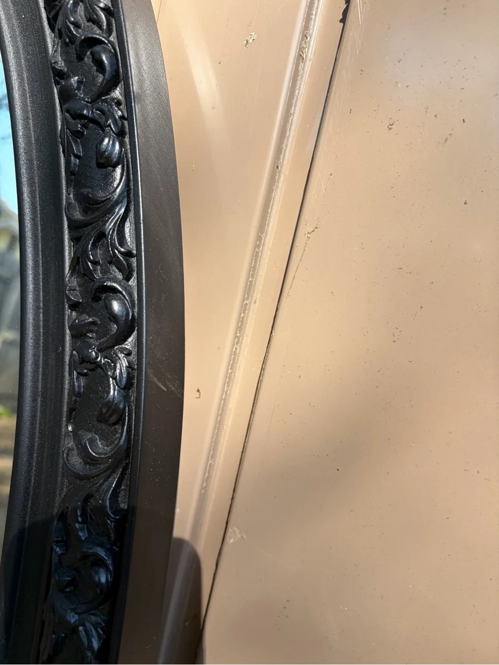 Classic Black Oval Wall Mirror with Ornate Frame